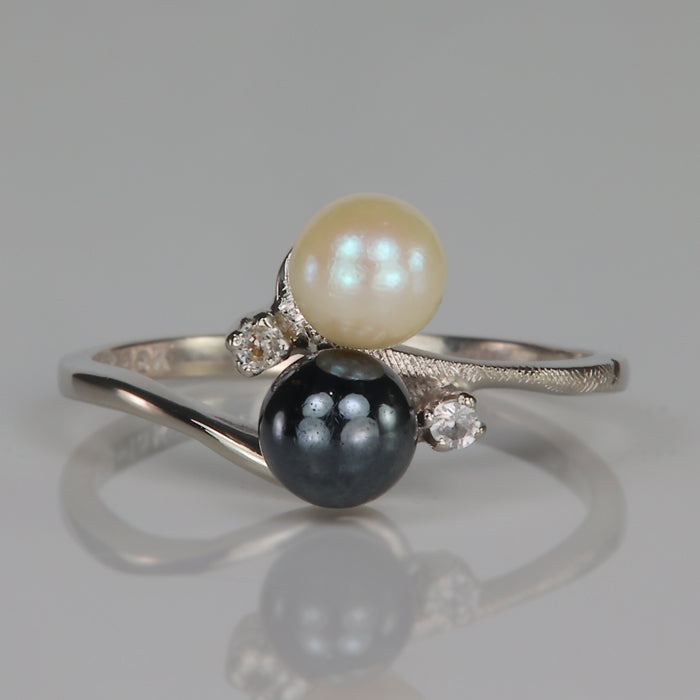 white gold and two color pearl and clear stone ring