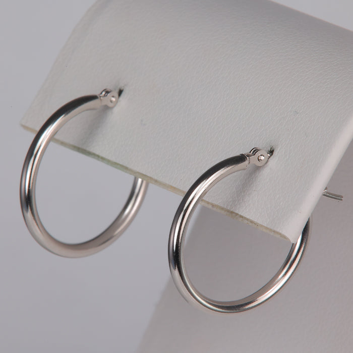 white gold hoop earrings with hinged backs