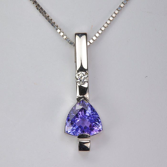 blue violet trilliant cut tanzanite gemstone pendant with diamond accent