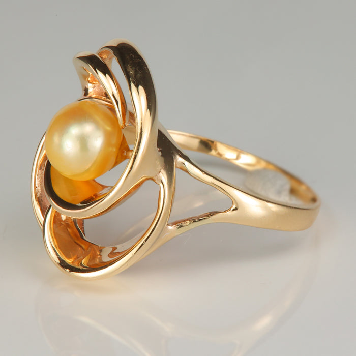 golden color pearl ring in yellow gold