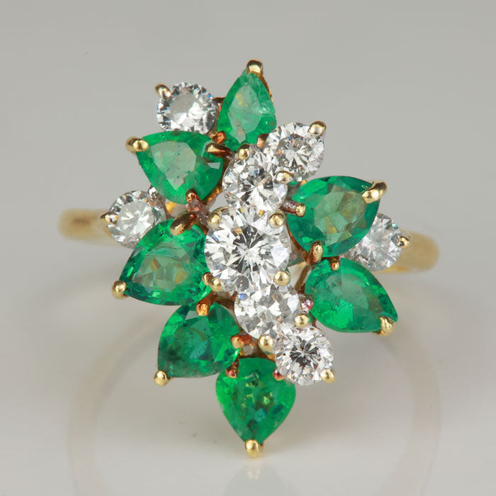 estate emerald ring in yellow gold with diamonds