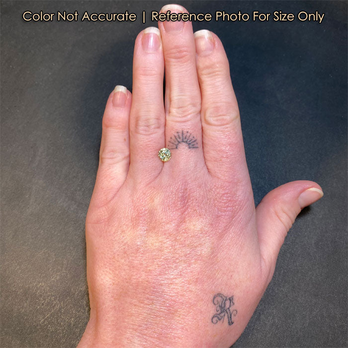 size of yellow green sapphire to hand