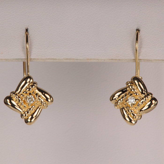 yellow gold earrings with a woven square design with diamonds
