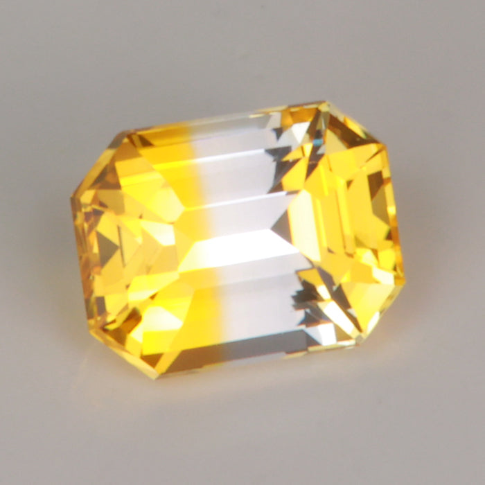 bicolor yellow and clear sapphire gemstone