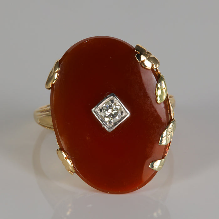 carnelian ring with leaf prongs and diamond center