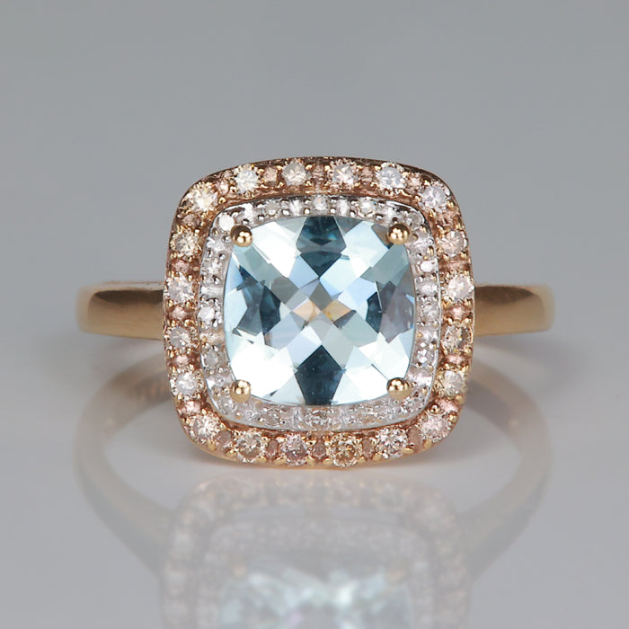 checkerboard square cushion cut aquamarine ring with diamonds