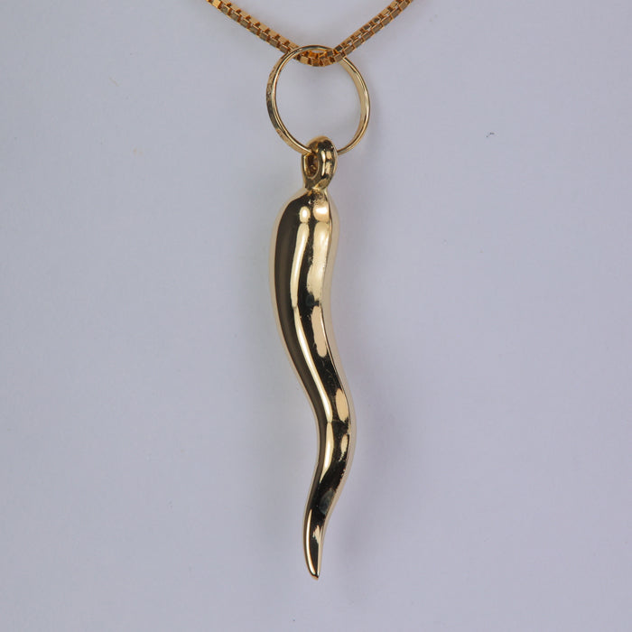 estate horn pendant in yellow gold