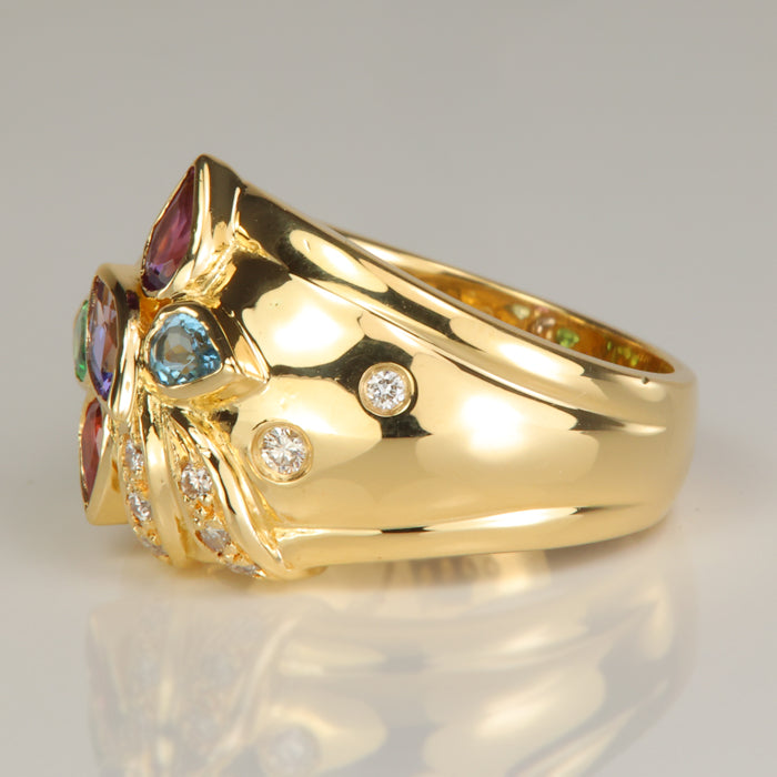 gemstone ring with tanzanite, tourmaline, aquamarine, amethyst and tsavorite and diamond accents