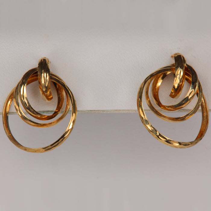 estate vintage earrings in yellow gold with looping circles