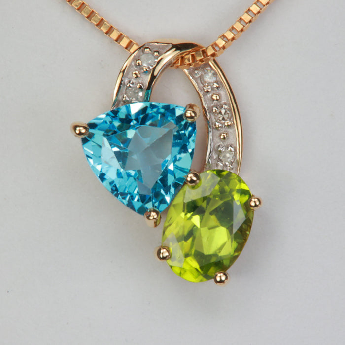topaz and peridot pendant with diamonds in yellow gold