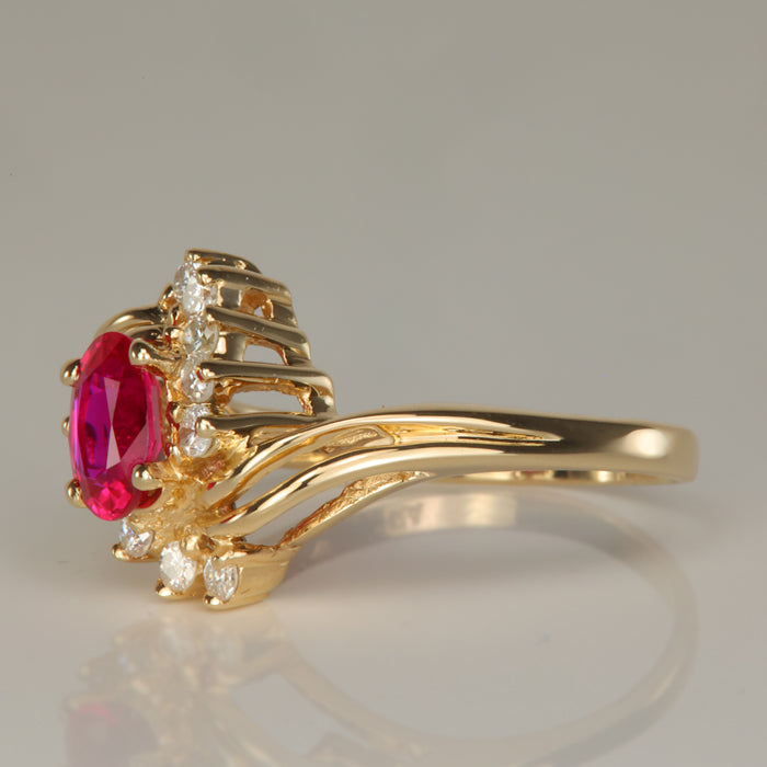 yellow gold oval ruby and diamond ring
