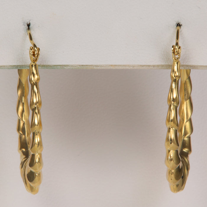gold scallop style earrings