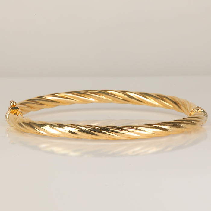 yellow gold twist bracelet bangle style