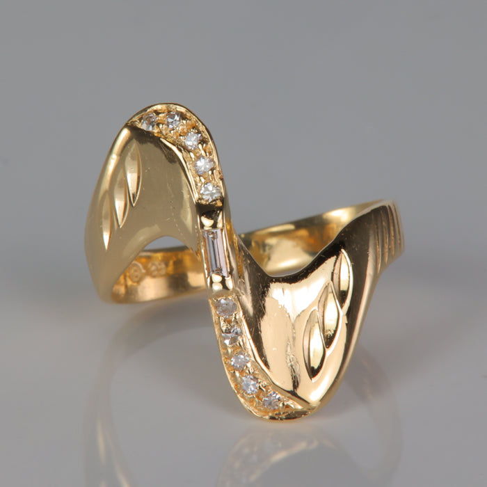 estate gold wave style ring with diamond accents