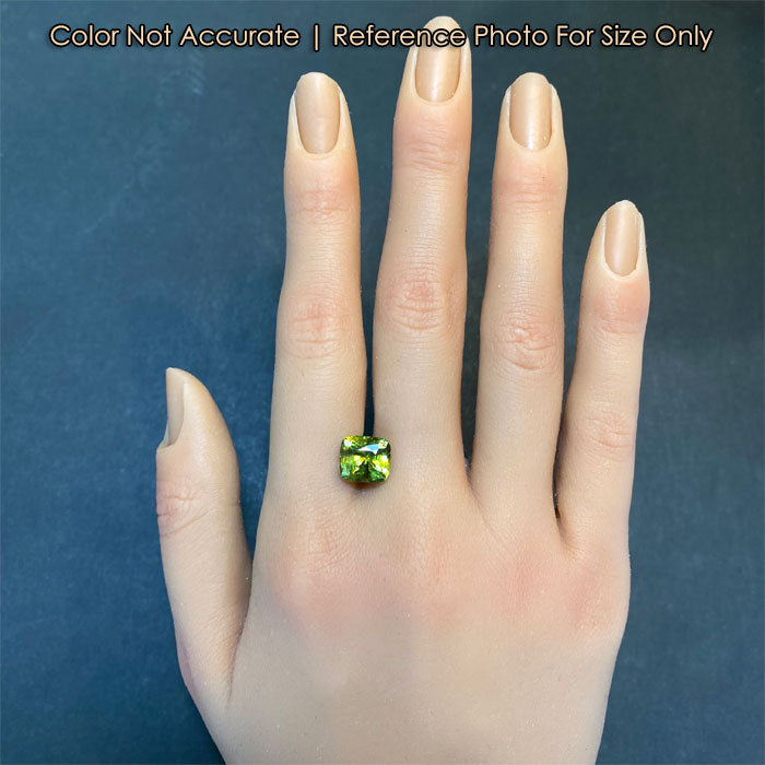 green sphene gemstone size on a hand