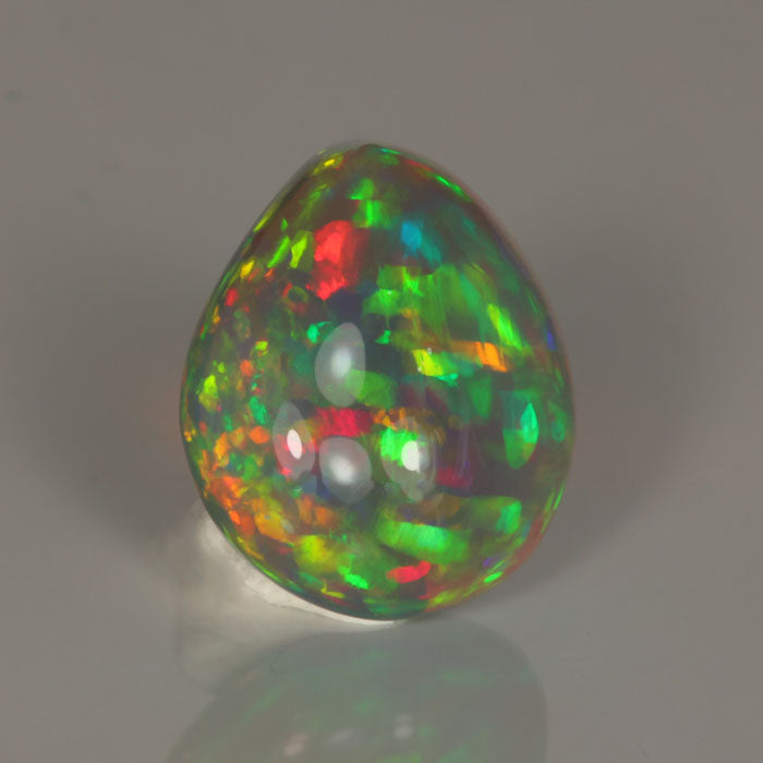 pear shape black opal gem