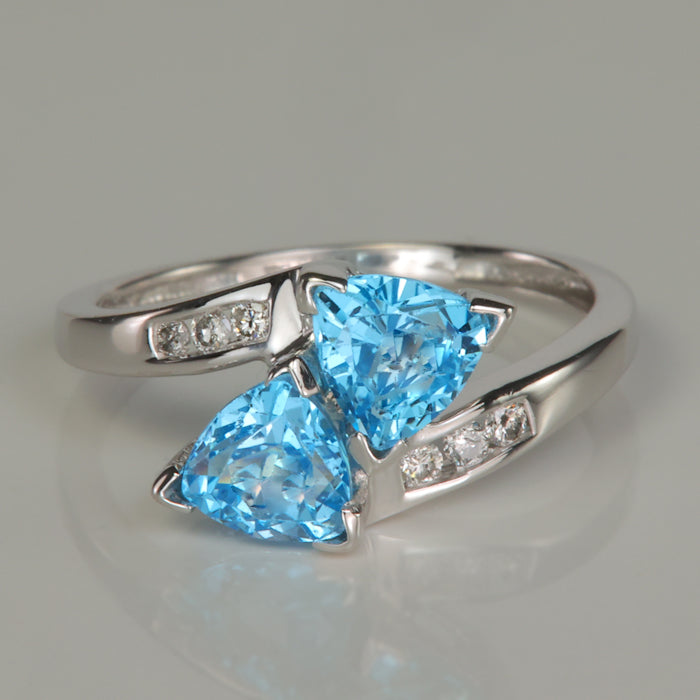 White gold blue topaz and diamond ring