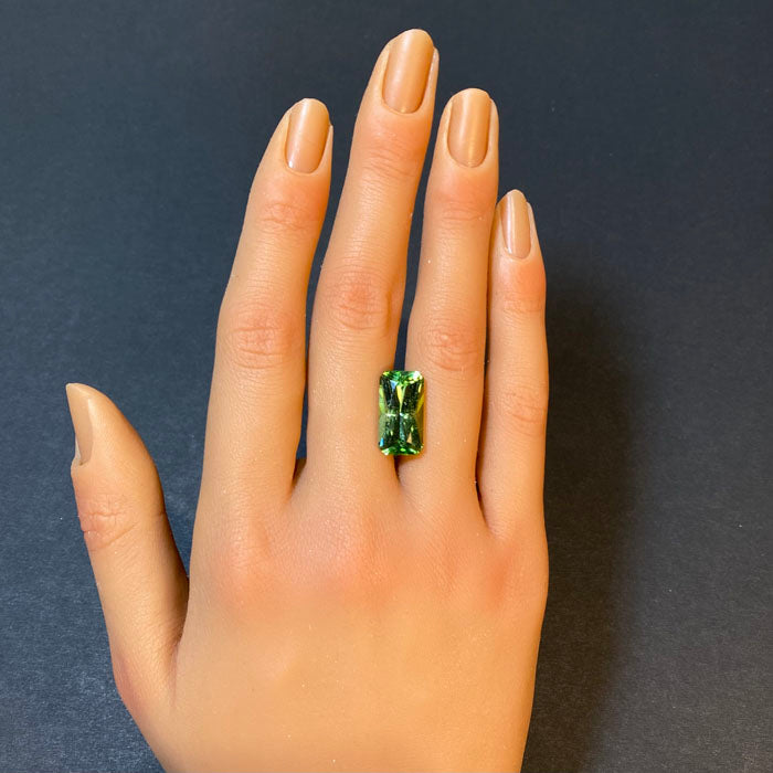 mint green brilliant emerald cut peridot