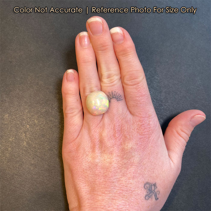 opal gemstone on hand antique cushion cut