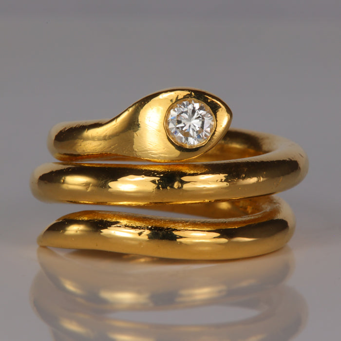 24k yellow gold snake ring with diamond