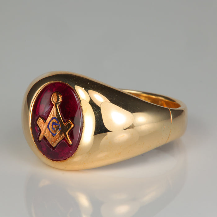 yellow gold synthetic ruby ring with freemason logo