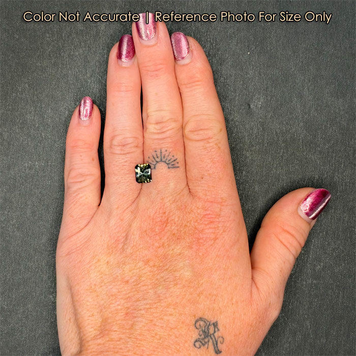 tanzanite gemstone on hand fancy
