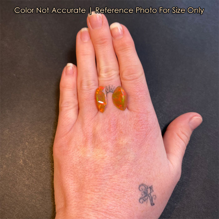 ethiopian opal gemstones on hand size reference