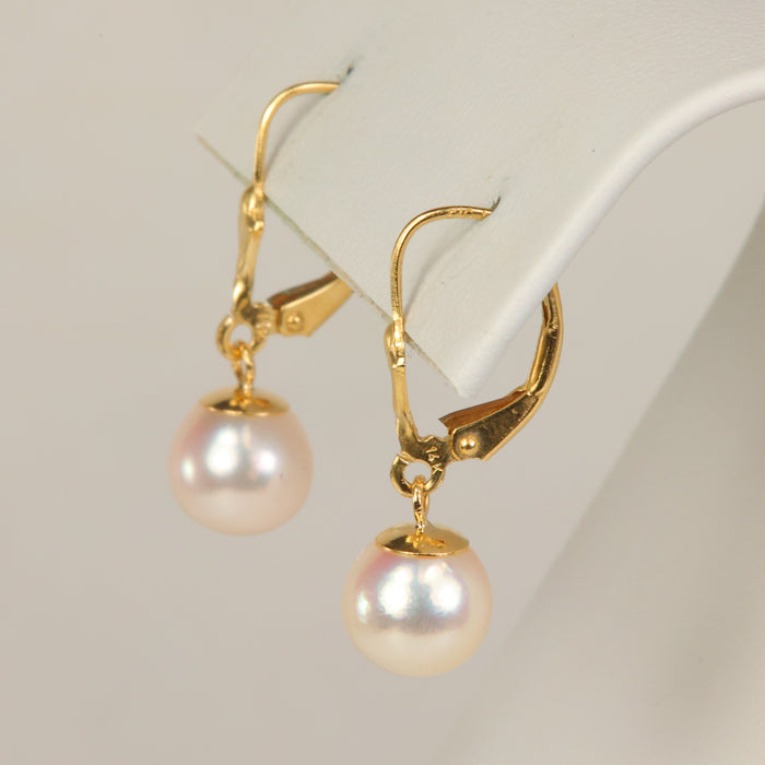 yellow gold pearl drop earrings with hinged back