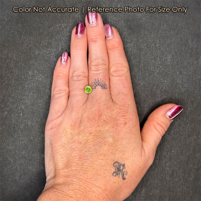 size of green fancy tanzanite gem
