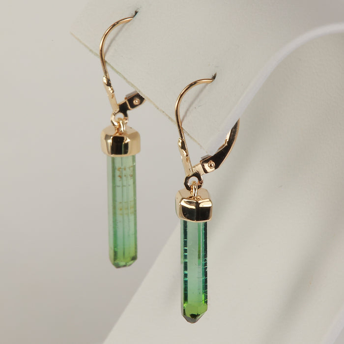 green color crystal earrings in yellow gold