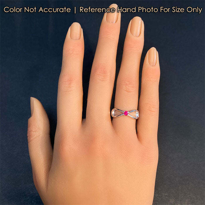 white gold infinity ring with ruby gemstone