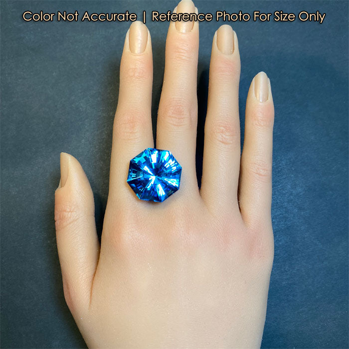 swiss blue topaz gemstone size to a hand