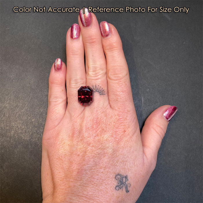 large barion emerald cut zircon on hand