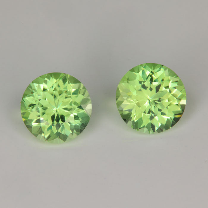 round mint green peridot gemstone pair