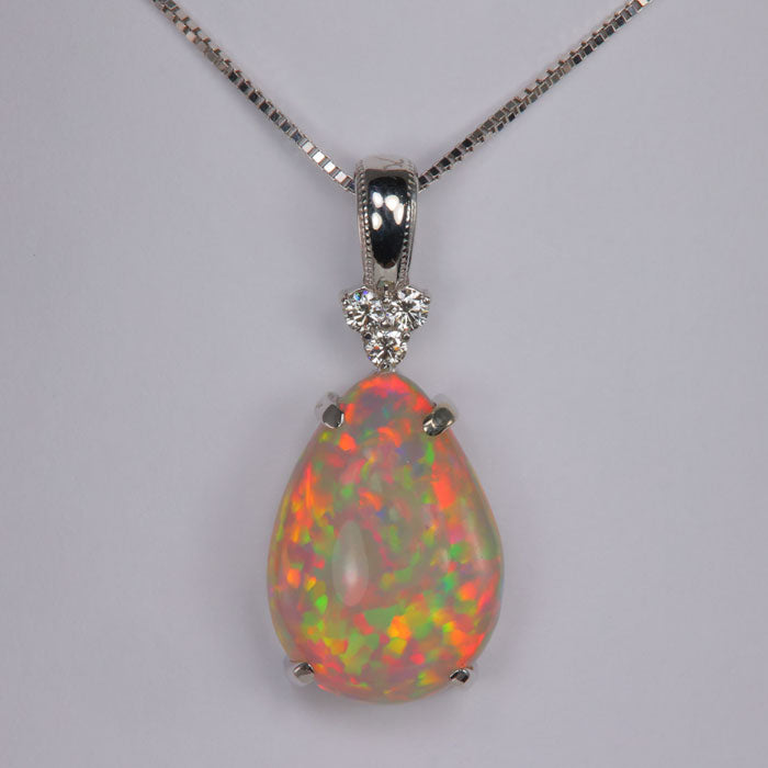 opal pendant with diamond accents white gold