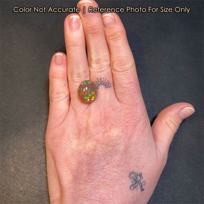 opal gemstone on hand size reference