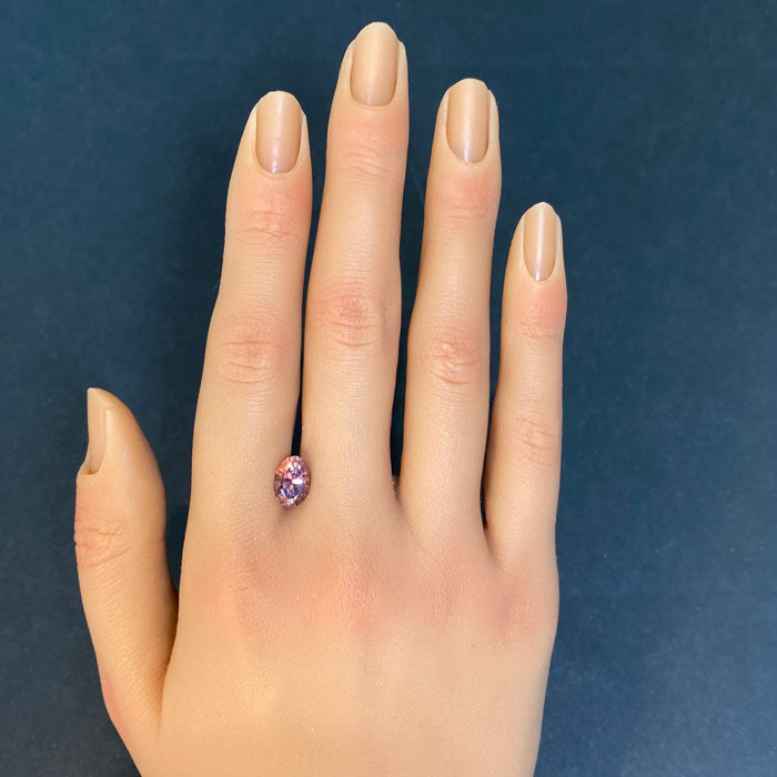 imperial zircon gemstone oval brownish peachy pink