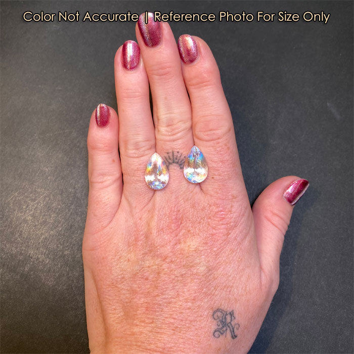 pear shape moonstone pair on hand