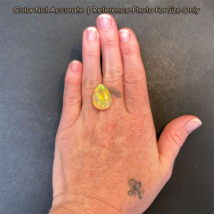 rainbow color opal gemstone on hand size