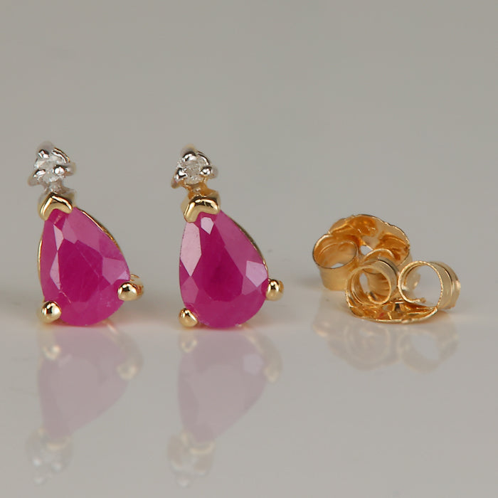 violet red ruby yellow gold and diamond studs