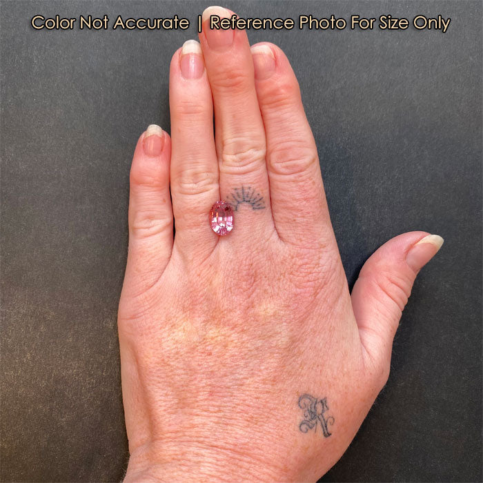 garnet gemstone oval cut on hand 5.19cts