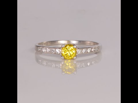 Platinum Fine Diamond Ring .45 Carats (Total) Enhanced Yellow Center