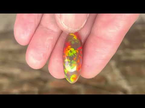 Dark Base Colorful Ethiopian Opal Gemstone