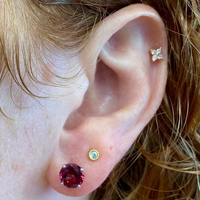 garnet stud earrings in white gold
