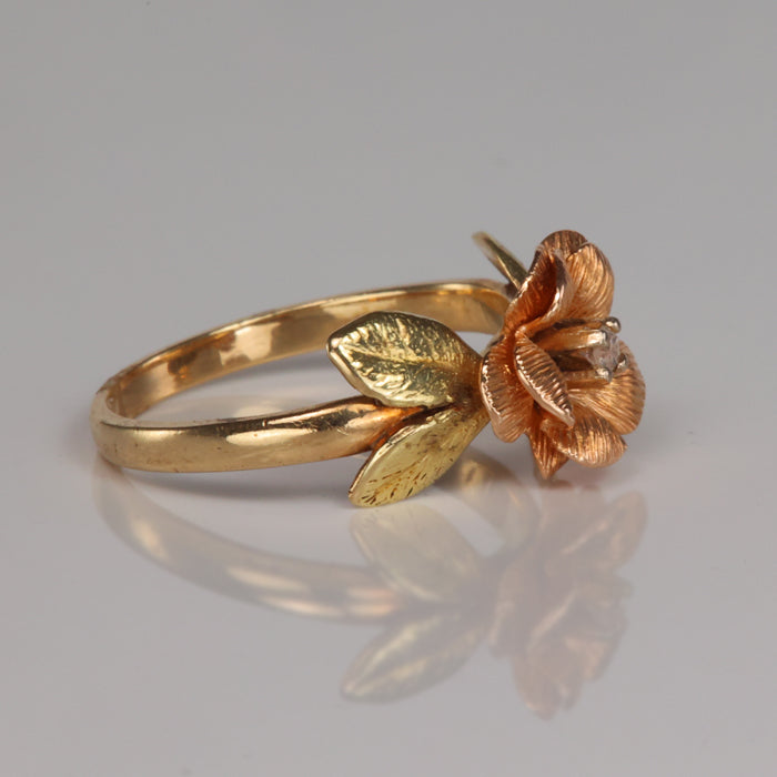 rose and yellow gold flower ring with diamond accent