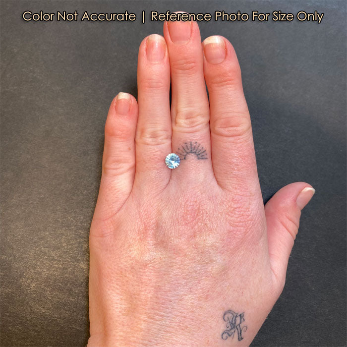 aquamarine gem on hand