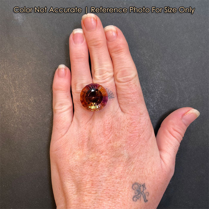 ametrine gemstone on hand apex symphonia cut