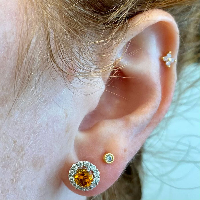 orange sapphire earrings with diamonds