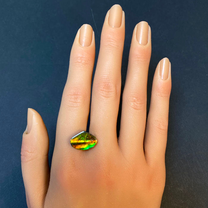 small wide pear ammolite gem