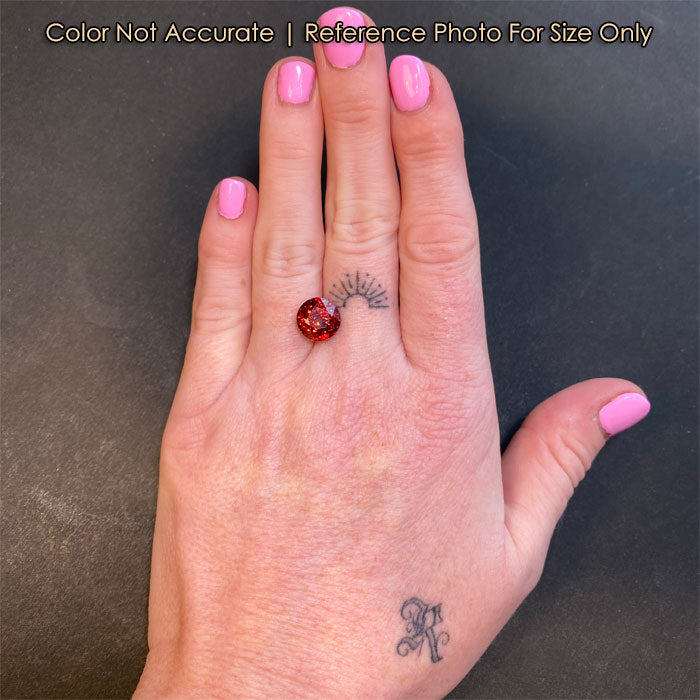 round orange spessartite garnet size to hand
